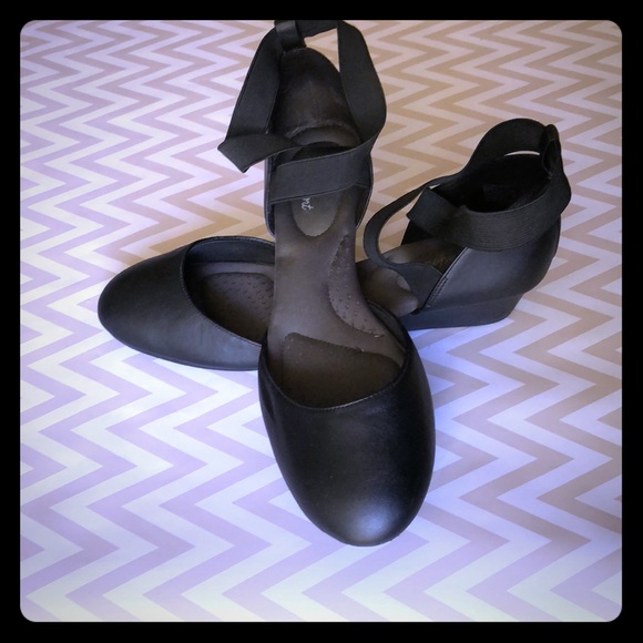 flats with straps across foot